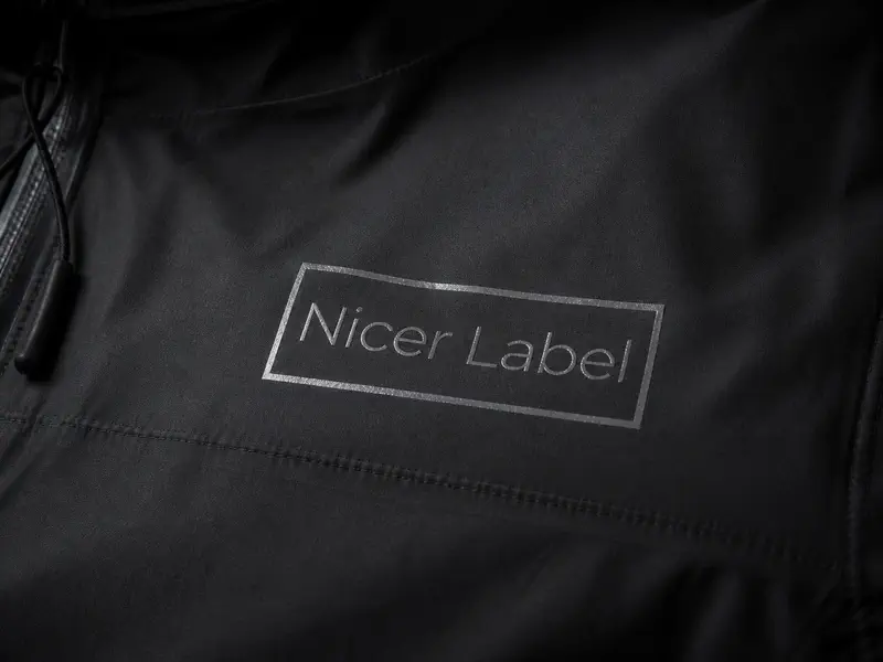 Reflective heat transfer label on technical clothing